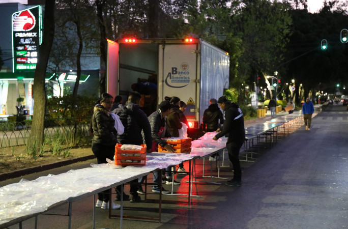 Unloading bread off a truck