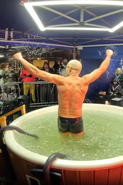 Man celebrating in the ice bath