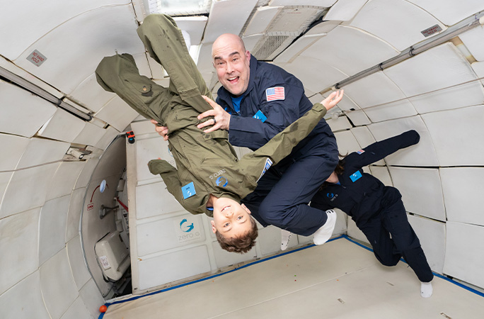 Jack upside down with dad flying