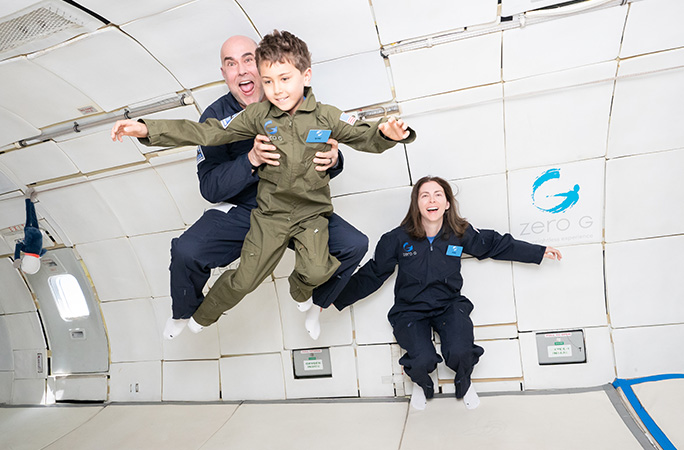 Jack with parents flying