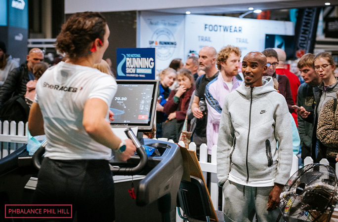 Sir Mo Farah visits Sophie while she runs on a treadmill