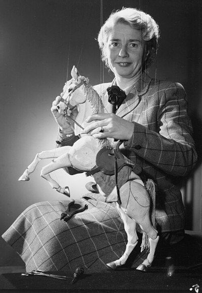 Portrait of Ann Hogarth with puppet Muffin the Mule (1952). Photo credit: Max Dupain & Mitchell Library, State Library of New South Wales 