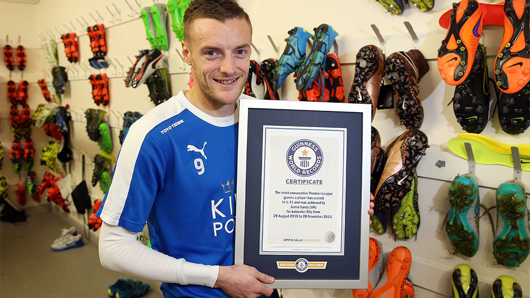 Jamie Vardy posing with a Guinness World Records certificate