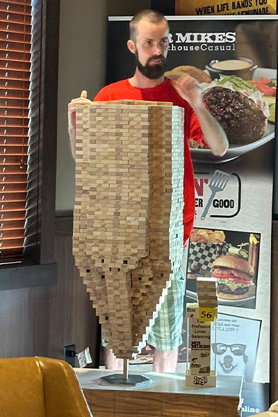 Abbetjes stood behind his tower