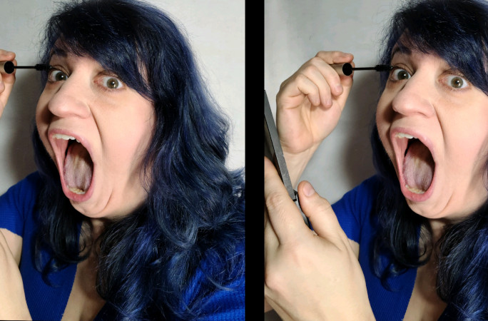 Marie applying makeup with her mouth open