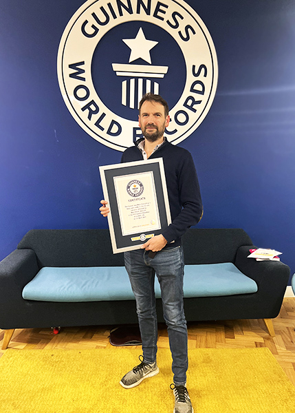 Ollie with GWR certificate and blue background