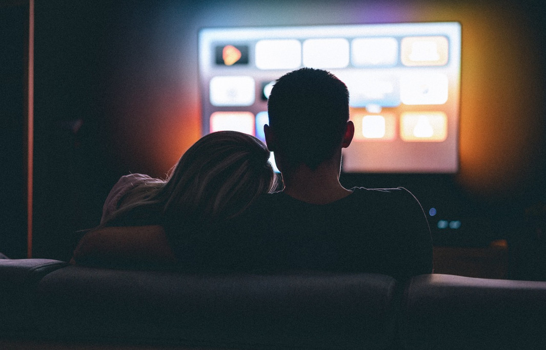 Header: generic image of a couple watching TV. Photo credit: yousafbhutta/ Pixabay.  