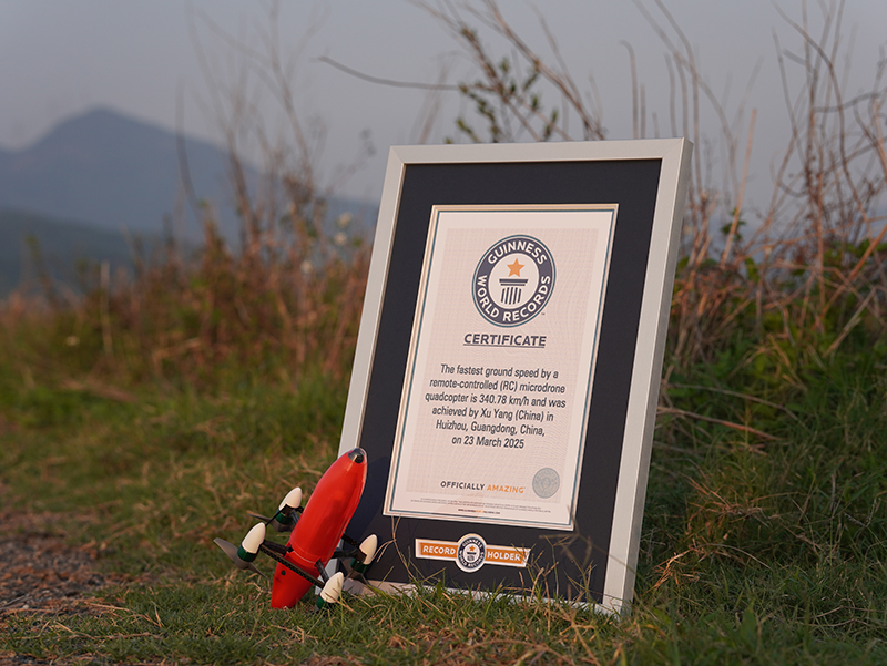 remote controlled microdrone quadcopter with GWR certificate on the grass