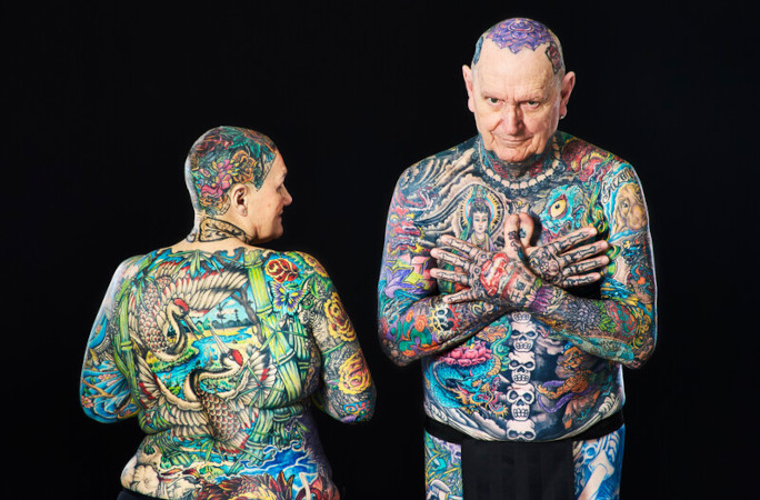 Senior citizen couple with the most tattoos