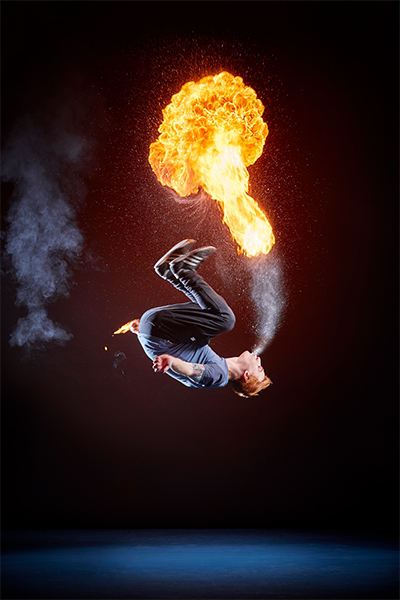 Ryna doing a backflip while breathing fire