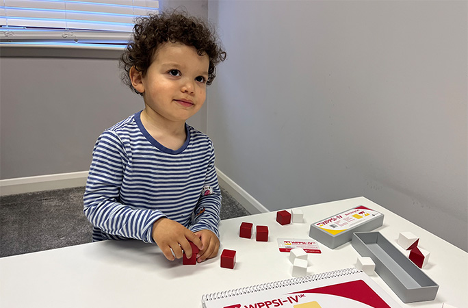 Joseph solving a puzzle