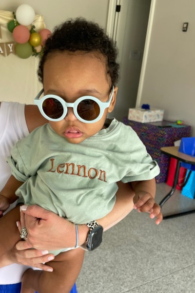 Lennon wearing sunglasses