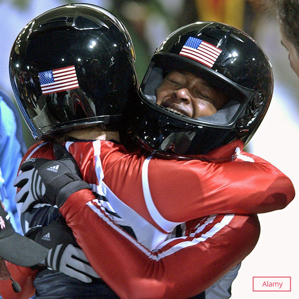 Flowers hugging her teammate
