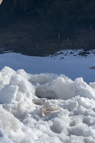 Peek of Elias' head in the snow