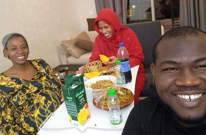 Pregnant Halima posing for a group pic