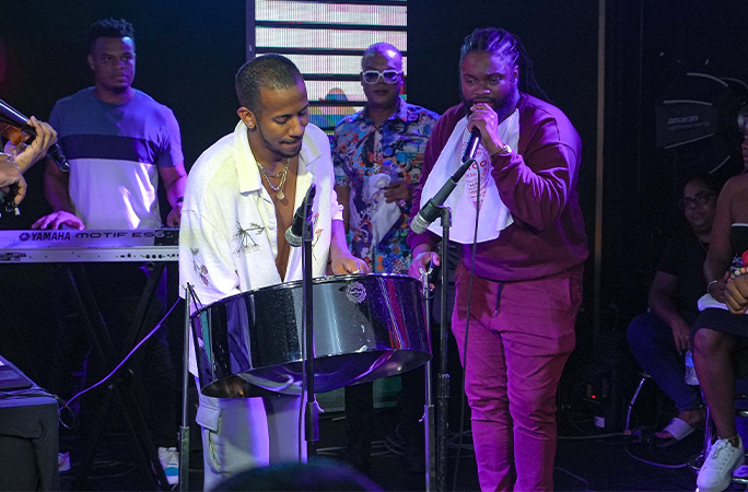 Joshua playing with other musicians
