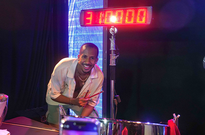 Joshua posing with the 31-hour clock