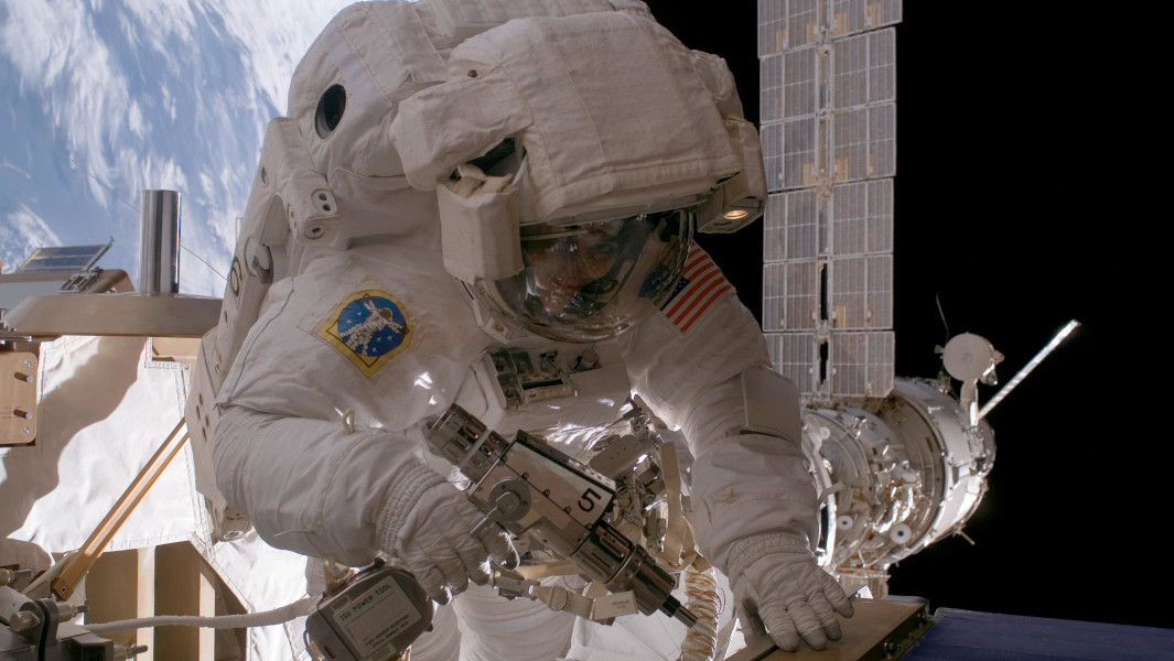 Astronaut Suni Williams fixing the space station outside the ISS on a space walk