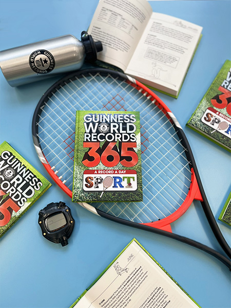Tennis and books with a blue background