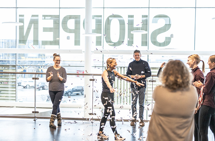 Lisa being showered with confetti