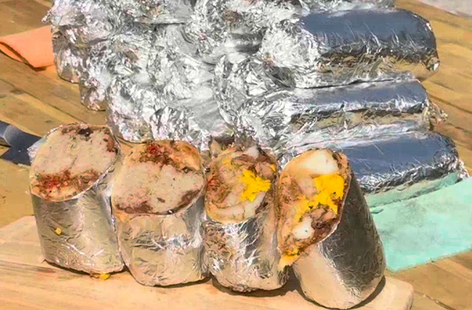 largest scotch egg made into burritos