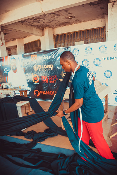 Samuel working with the material