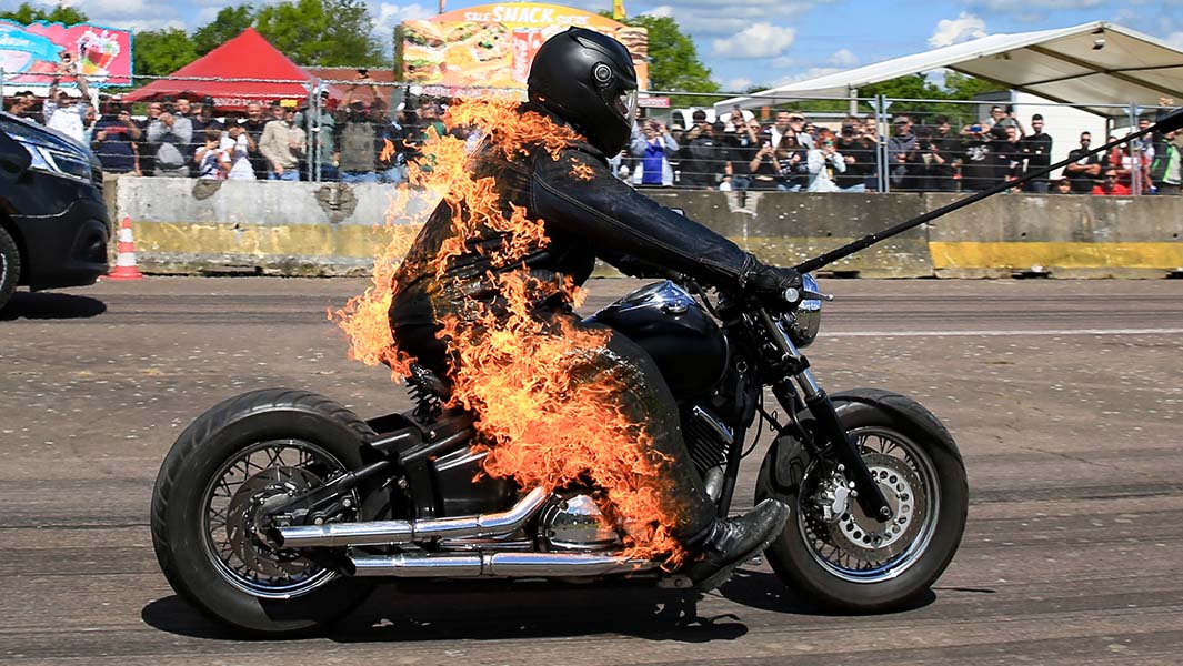 Jonathan riding his motorbike while on fire