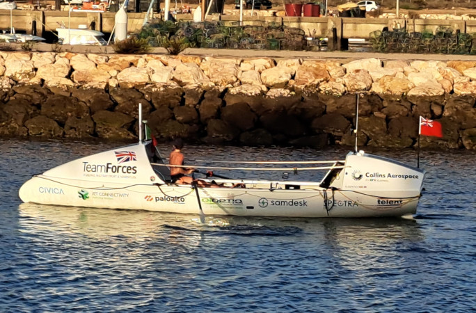 Zara rowing near the coast
