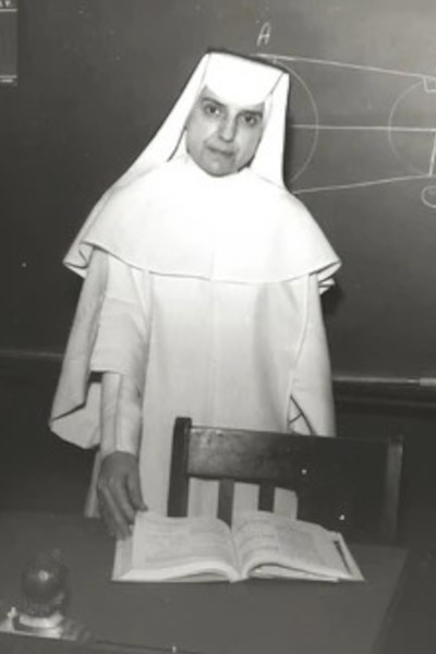 Francis teaching in her habit