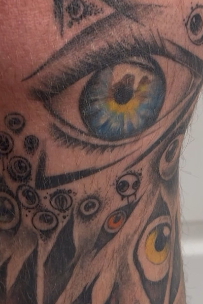 The blue eye on Chad's leg