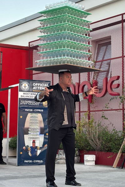 Ari balancing the glasses with no hands