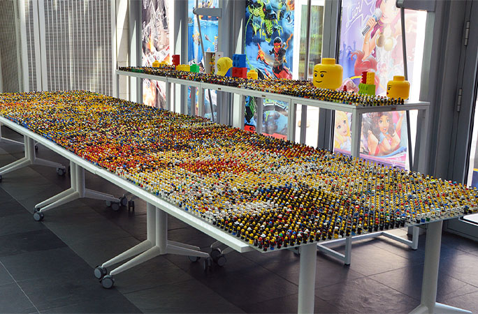 table full of lego minifigures