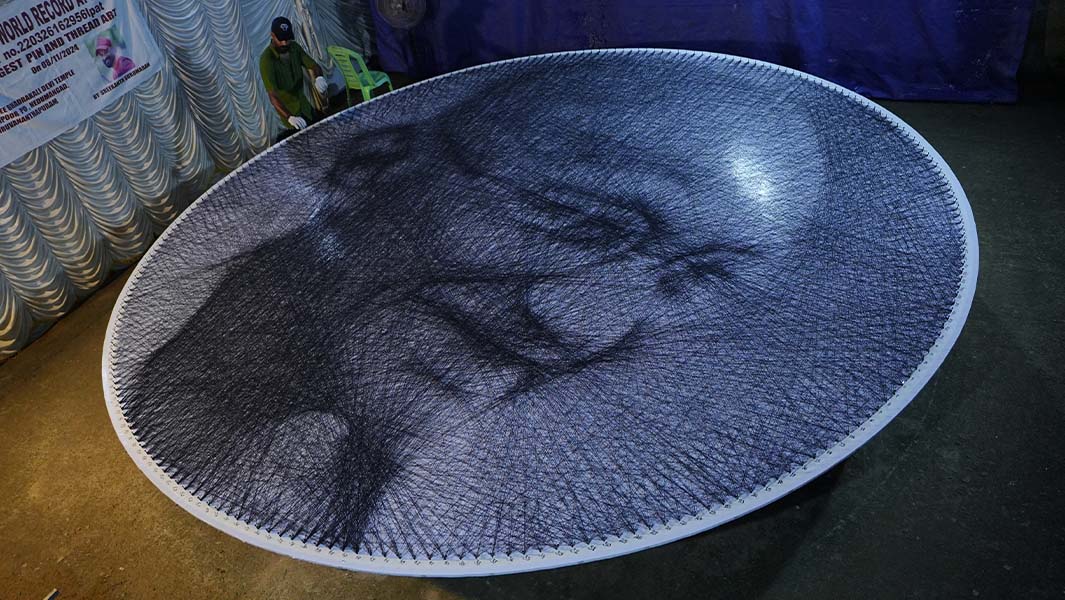 the largest pin and thread art depicts Gandhi