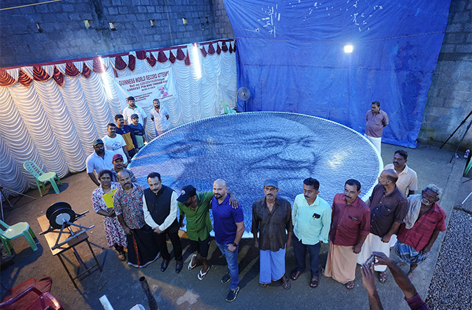 people posing with the art
