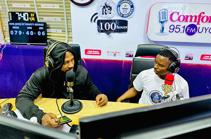 George interviewing fashion designer Edidiong John