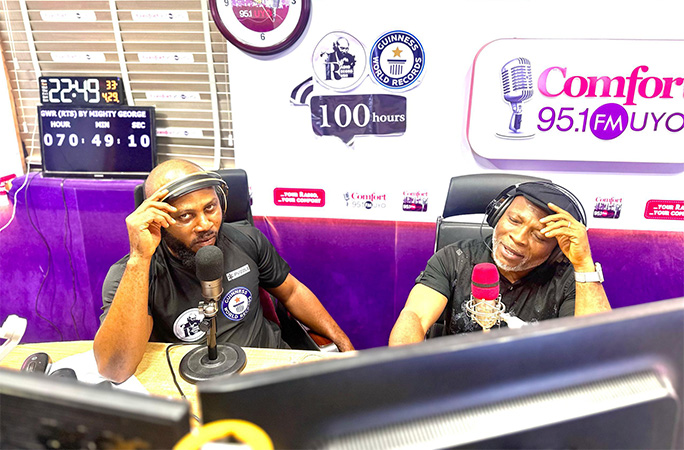 George interviewing musician Christopher Ersin AKA Mista XTO