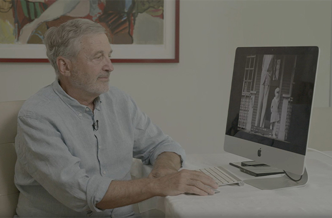 Bruce watching the video