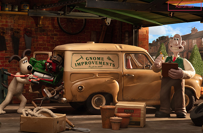 Wallace and Gromit loading their Gnome Improvements van in their garage