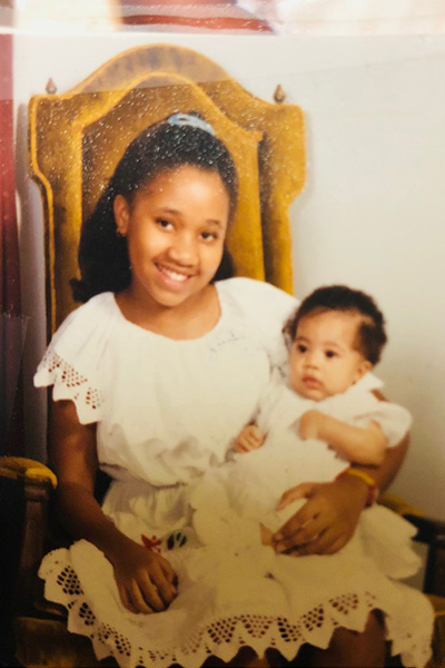 Aevin aged 11 with her baby sister