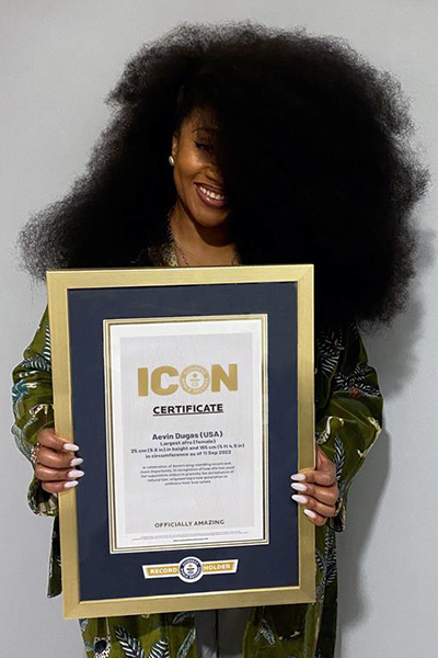 Aevin holding her official GWR ICON certificate