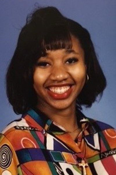 Aevin at college when she used to straighten her hair
