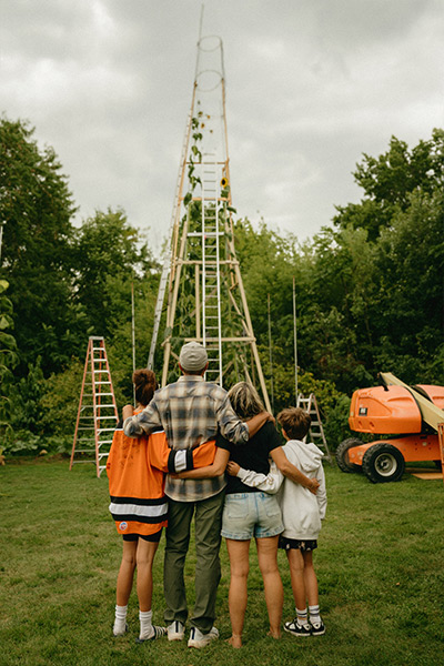 babich-family-looking-out-at-their-record-breaking-sunflower-grown-in-their-backyard