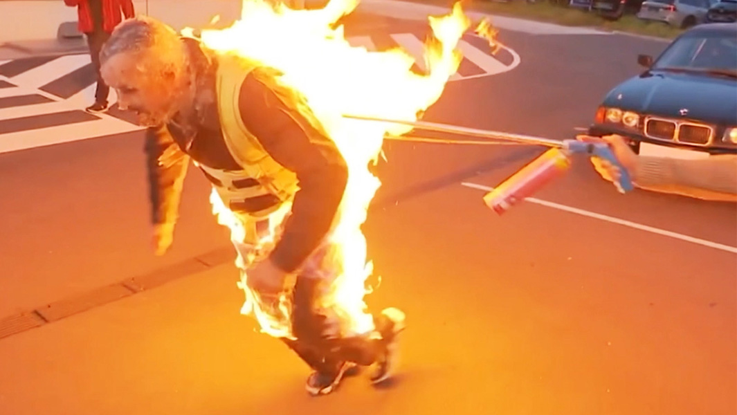 Josef pulling a car while on fire