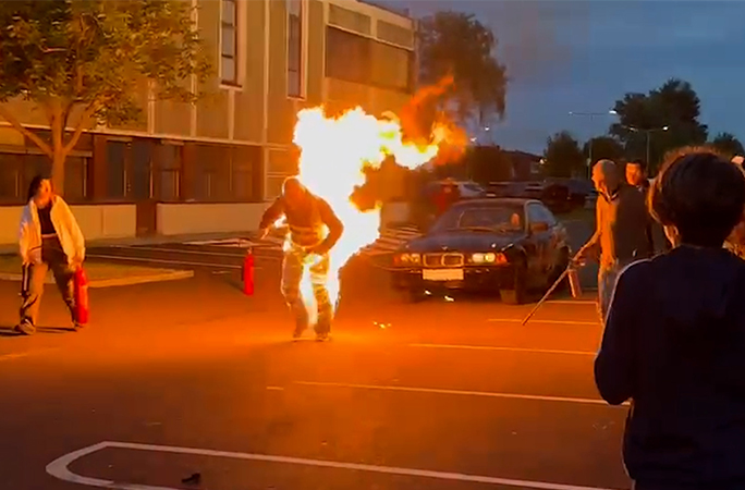 Josef pulling the car while on fire