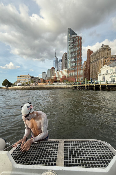 Michael climbing into the water
