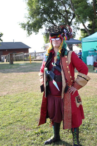 A pirate posing in his costume