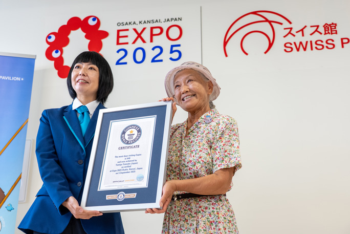 Tomiyo receiving the official certificate