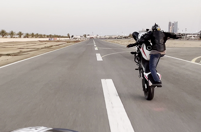 Ahmed riding down the track