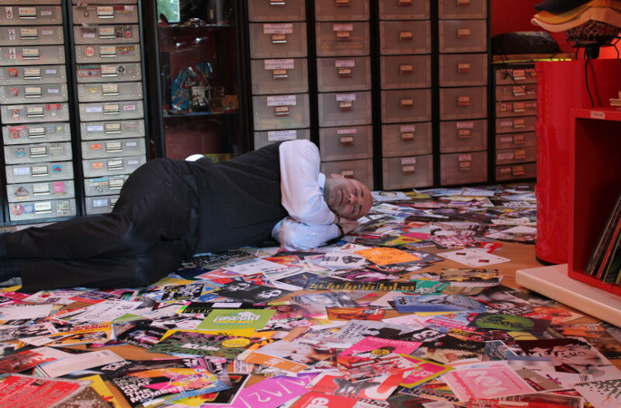 Marco sleeping on his posters