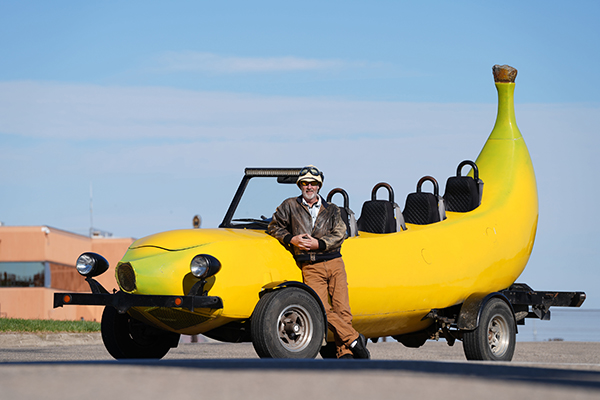 Steve smiling with banana car
